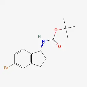 1,1-Dimethylethyl N-((1R)-5-bromo-2,3-dihydro-1H-inden-1-yl)carbamate