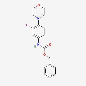 Carbamic acid, N-(3-fluoro-4-(4-morpholinyl)phenyl)-, phenylmethyl ester